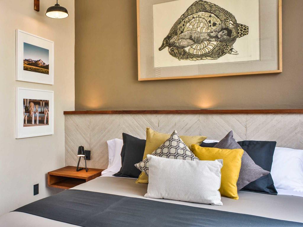 克里欧酒店 克雷塔罗 外观 照片 A bedroom at the hotel