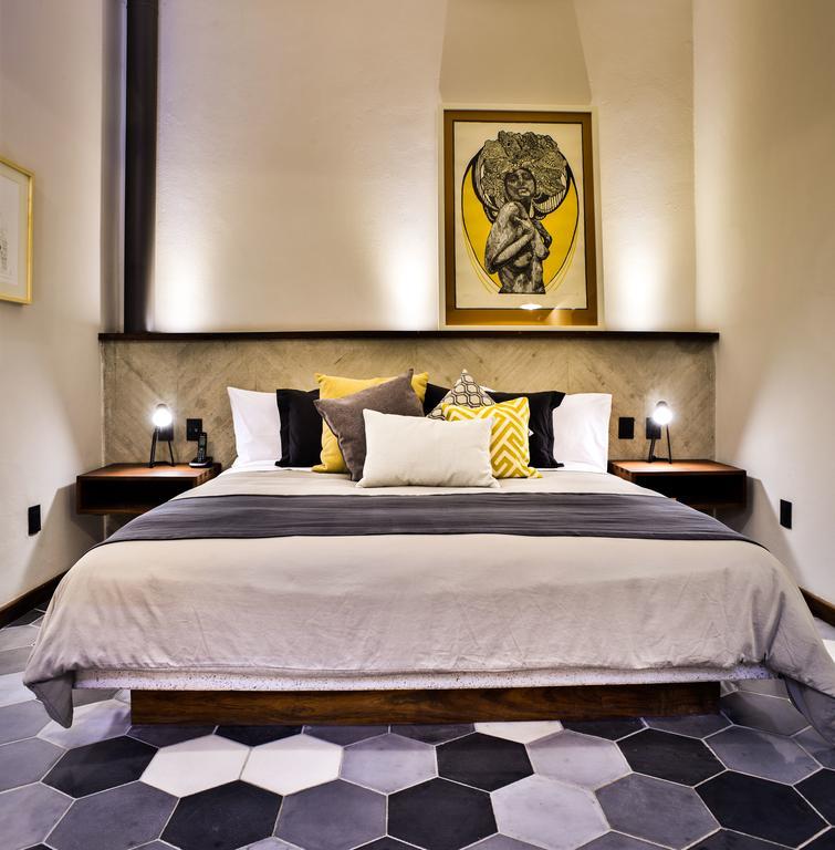 克里欧酒店 克雷塔罗 外观 照片 A bedroom at the hotel