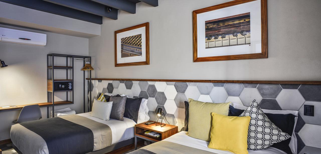 克里欧酒店 克雷塔罗 外观 照片 A bedroom at the hotel